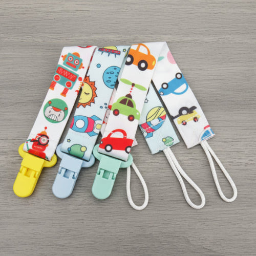 attache tetine trio transport