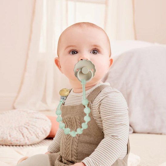 Attache tetine épuré