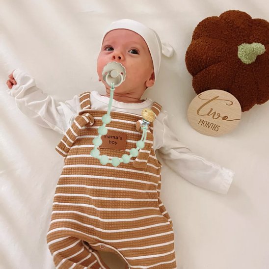 Attache tetine raffiné