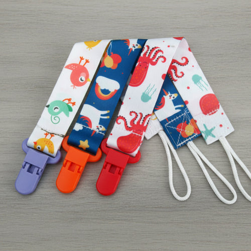 attache tetine trio animaux rouge