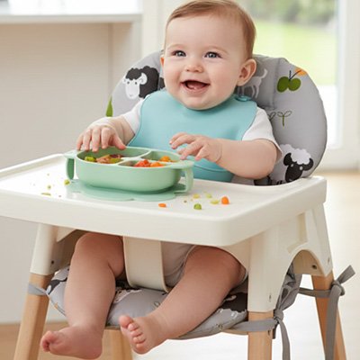 Coussin chaise haute décoratif