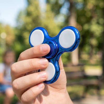 Hand spinner rotatif