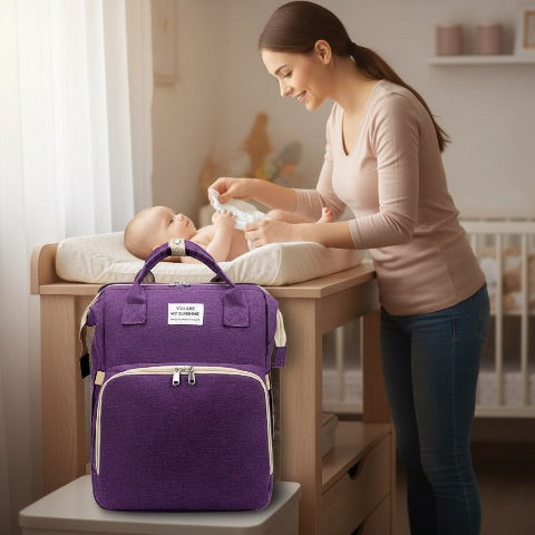 sac à langer lit mauve couches